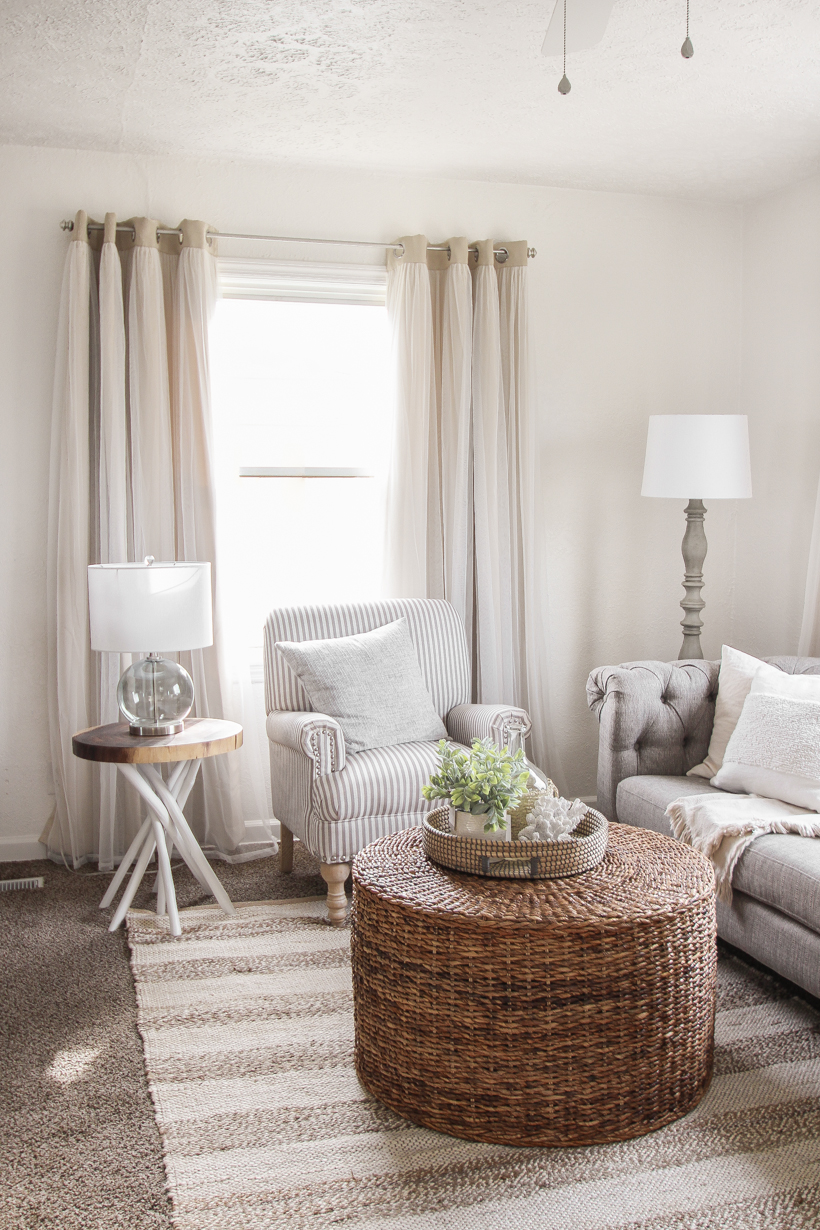 A small rental home decorated in a cozy beachy cottage style on a budget! Get all the details from home blogger and interior decorator Liz Fourez of lovegrowswild.com