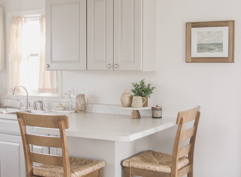 A small rental home decorated in a cozy beachy cottage style on a budget! Get all the details from home blogger and interior decorator Liz Fourez