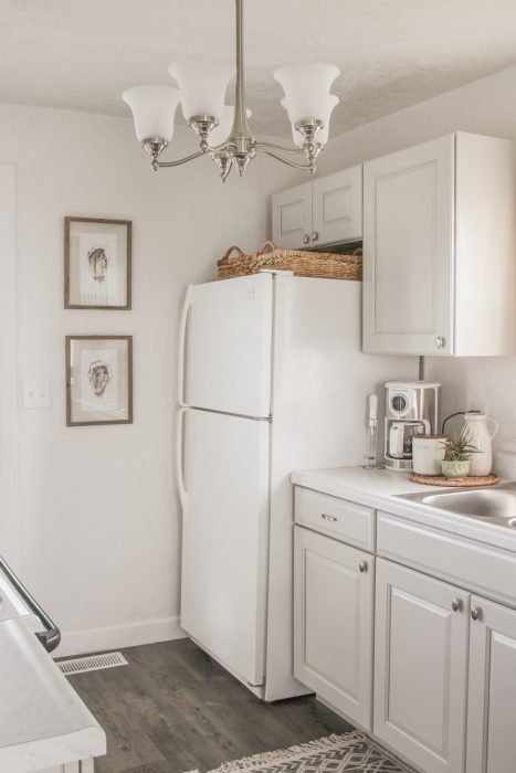 A small rental home decorated in a cozy beachy cottage style on a budget! Get all the details from home blogger and interior decorator Liz Fourez