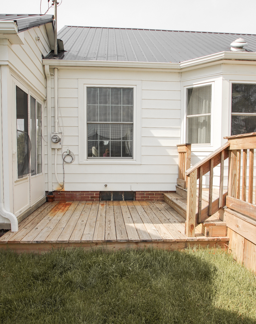 Interior decorator and home blogger Liz Fourez shares everything you need to know about staining a deck from prep to finish!