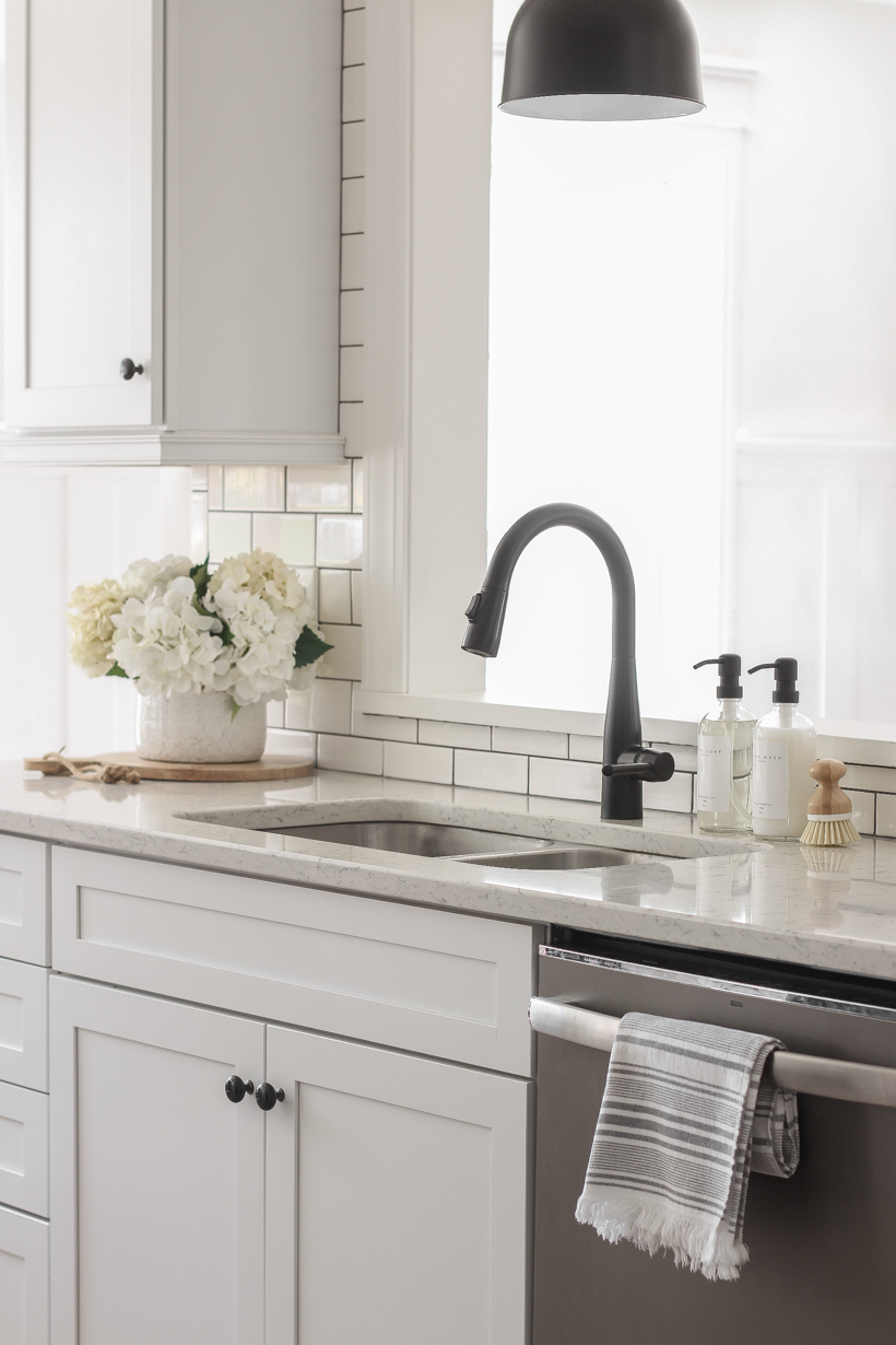 One Simple Way to Style Your Sink | Home blogger and interior decorator Liz Fourez shares tips for easily elevating your kitchen and bathroom