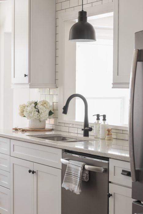 One Simple Way to Style Your Sink | Home blogger and interior decorator Liz Fourez shares tips for easily elevating your kitchen and bathroom