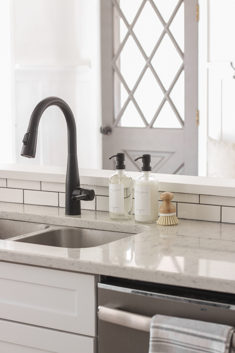 One Simple Way to Style Your Sink | Home blogger and interior decorator Liz Fourez shares tips for easily elevating your kitchen and bathroom
