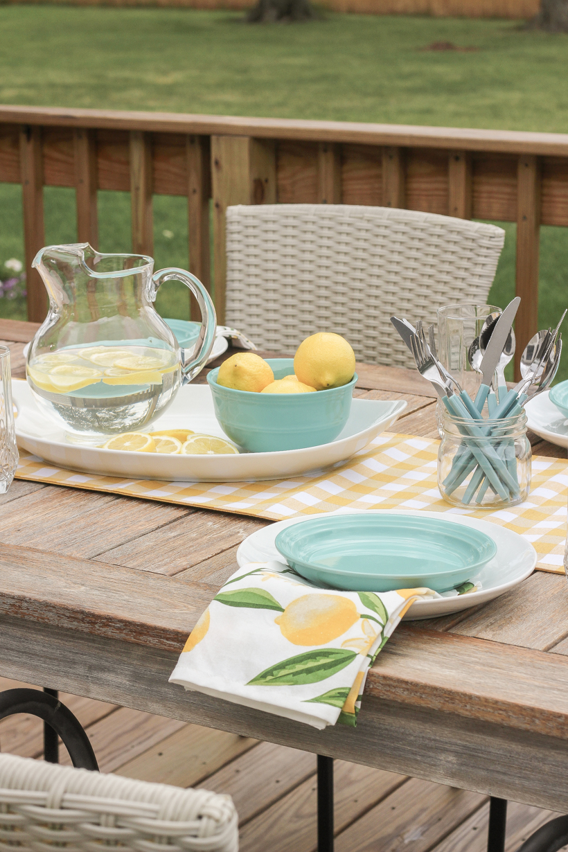 Designer and blogger Liz Fourez shows how to put together a simple, but charming lemon inspired table setting for summer.