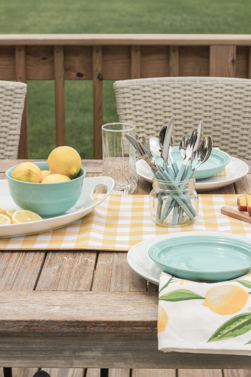 Designer and blogger Liz Fourez shows how to put together a simple, but charming lemon inspired table setting for summer.