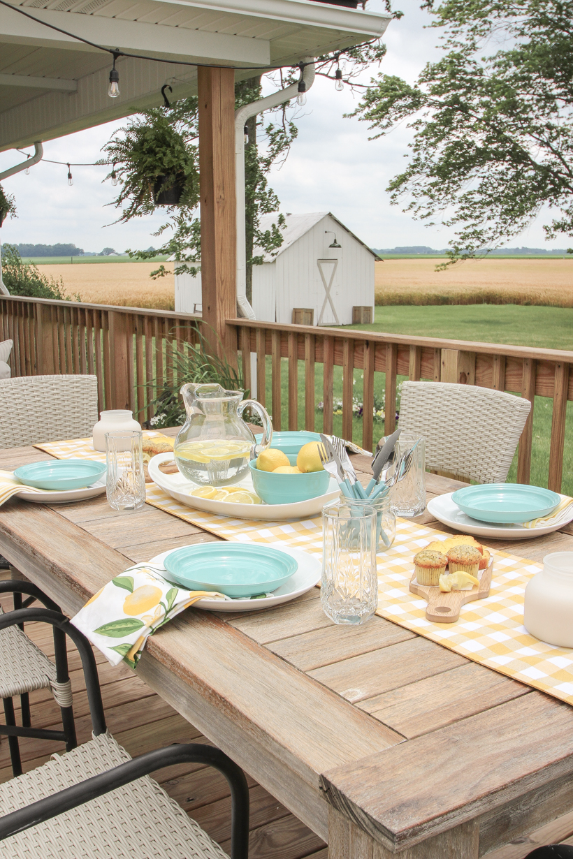 Designer and blogger Liz Fourez shows how to put together a simple, but charming lemon inspired table setting for summer.