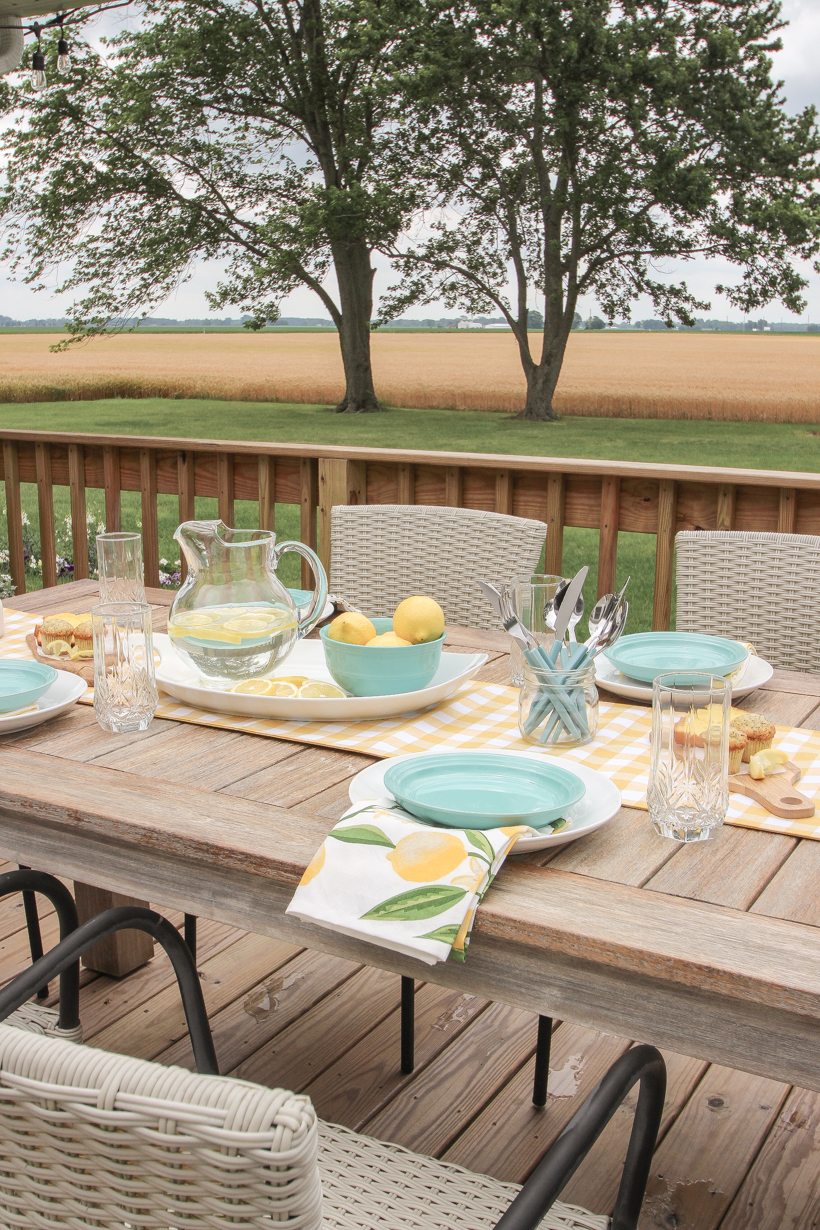 Designer and blogger Liz Fourez shows how to put together a simple, but charming lemon inspired table setting for summer.