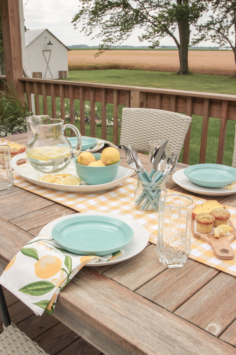 Designer and blogger Liz Fourez shows how to put together a simple, but charming lemon inspired table setting for summer.