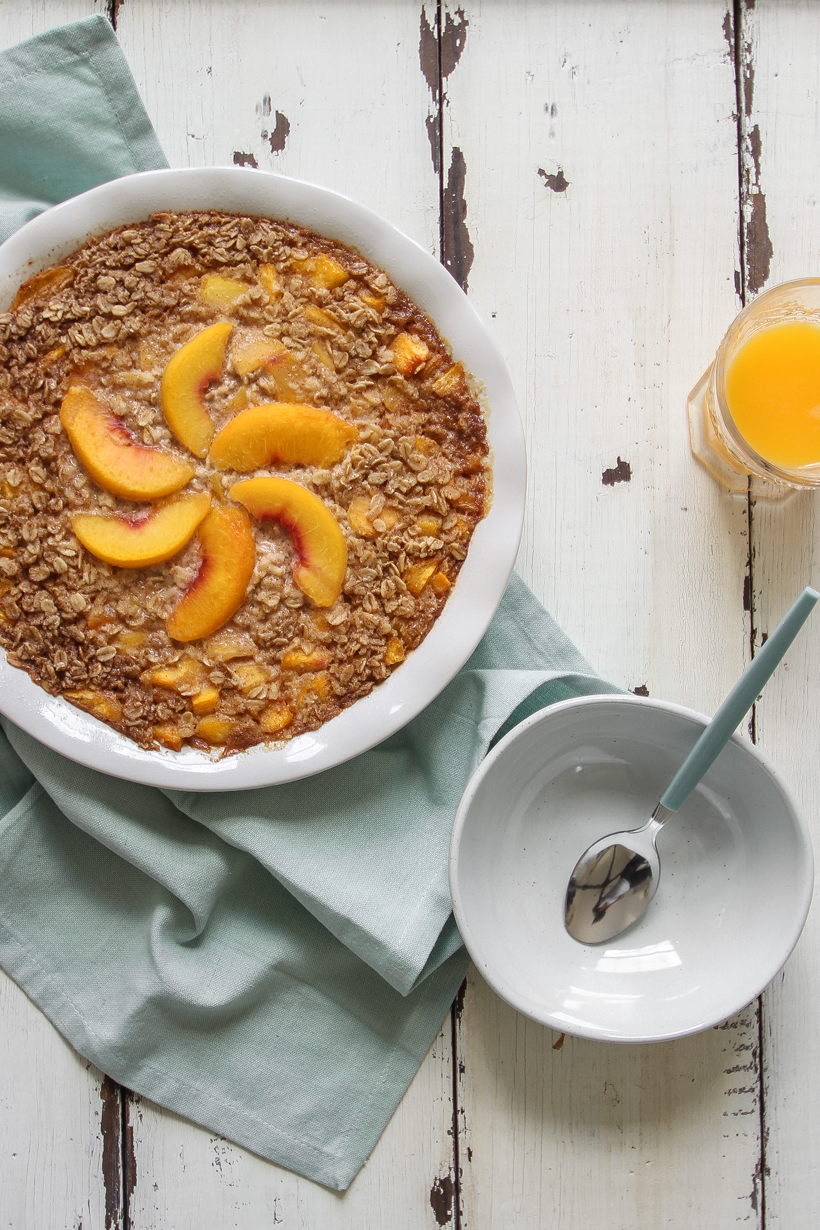 Blogger Liz Fourez of LoveGrowsWild.com shares a delicious peach baked oatmeal that is perfect for brunch or prepping a healthy breakfast for the week ahead.