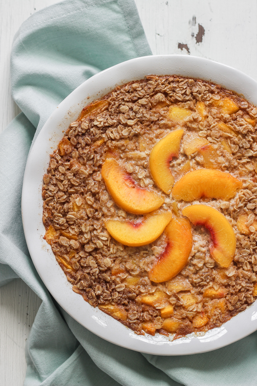 Blogger Liz Fourez of LoveGrowsWild.com shares a delicious peach baked oatmeal that is perfect for brunch or prepping a healthy breakfast for the week ahead.