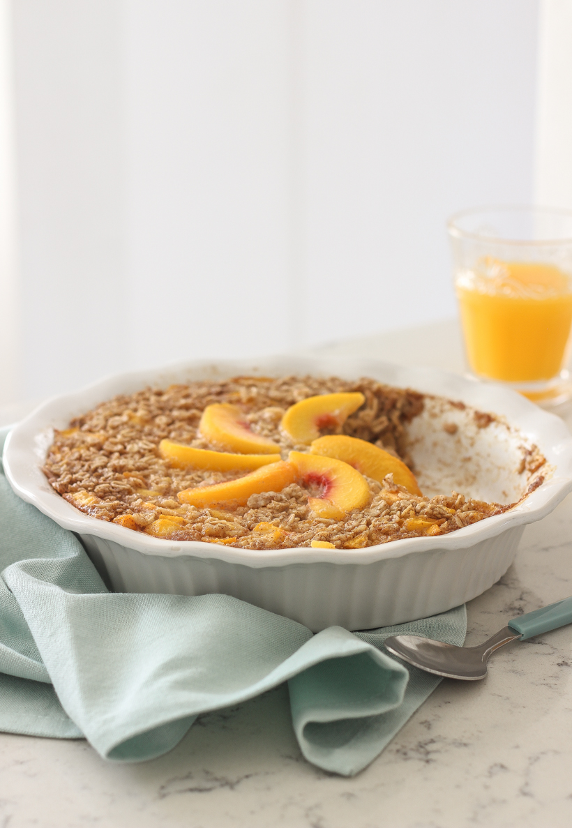 Blogger Liz Fourez of LoveGrowsWild.com shares a delicious peach baked oatmeal that is perfect for brunch or prepping a healthy breakfast for the week ahead.