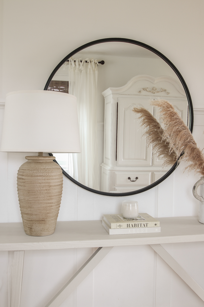 A beautiful neutral entryway shared by home blogger and interior decorator Liz Fourez