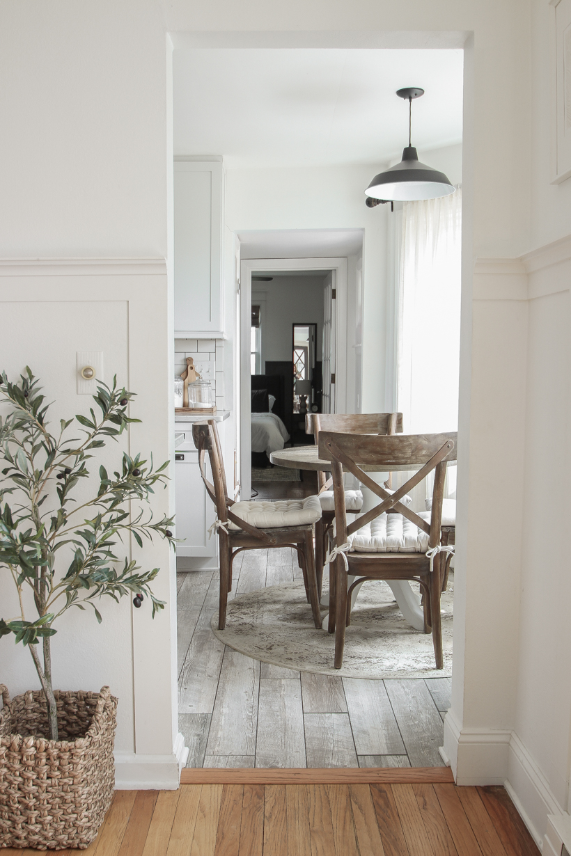 A beautiful neutral entryway shared by home blogger and interior decorator Liz Fourez