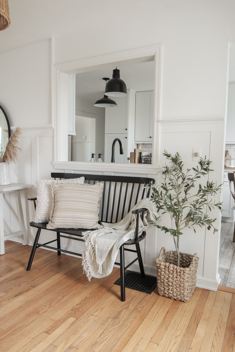 A beautiful neutral entryway shared by home blogger and interior decorator Liz Fourez