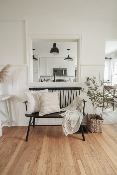 A beautiful neutral entryway shared by home blogger and interior decorator Liz Fourez