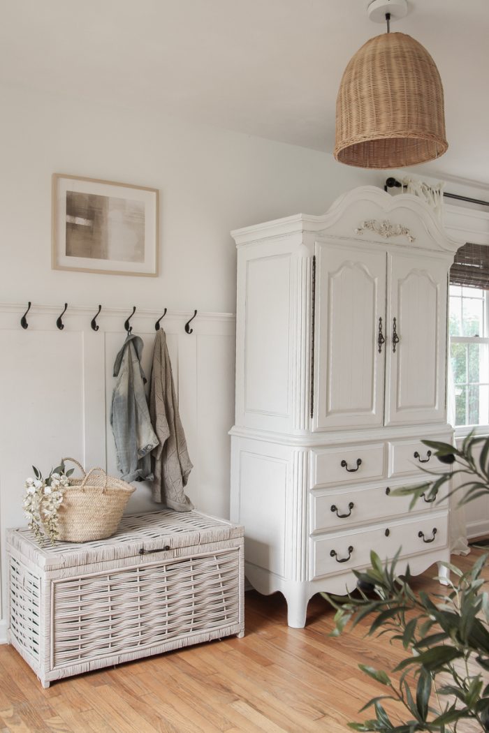 A beautiful neutral entryway shared by home blogger and interior decorator Liz Fourez