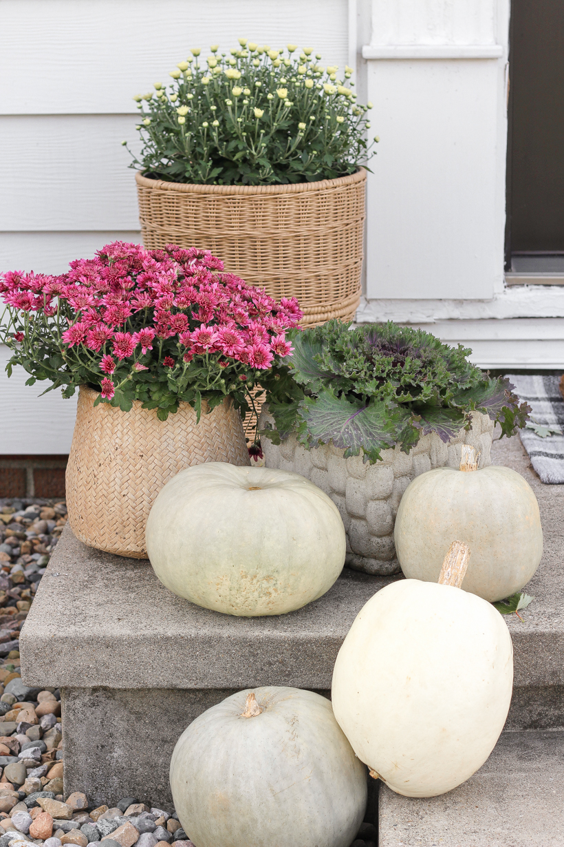 Home blogger and interior decorator Liz Fourez shares her small front porch decorated for fall with the perfect mix of soft neutrals and subtle color.