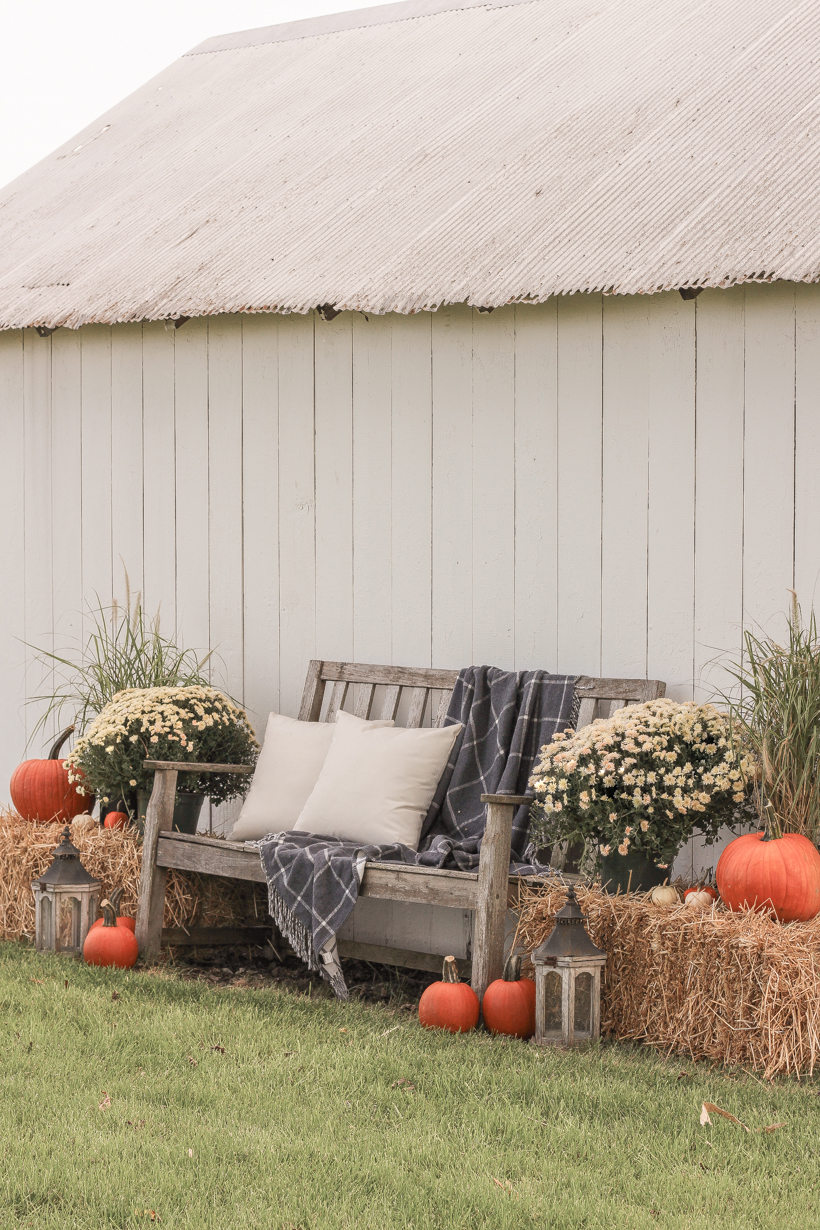 Home blogger and interior decorator Liz Fourez shares easy ideas for outdoor fall decorating on the cutest little barn