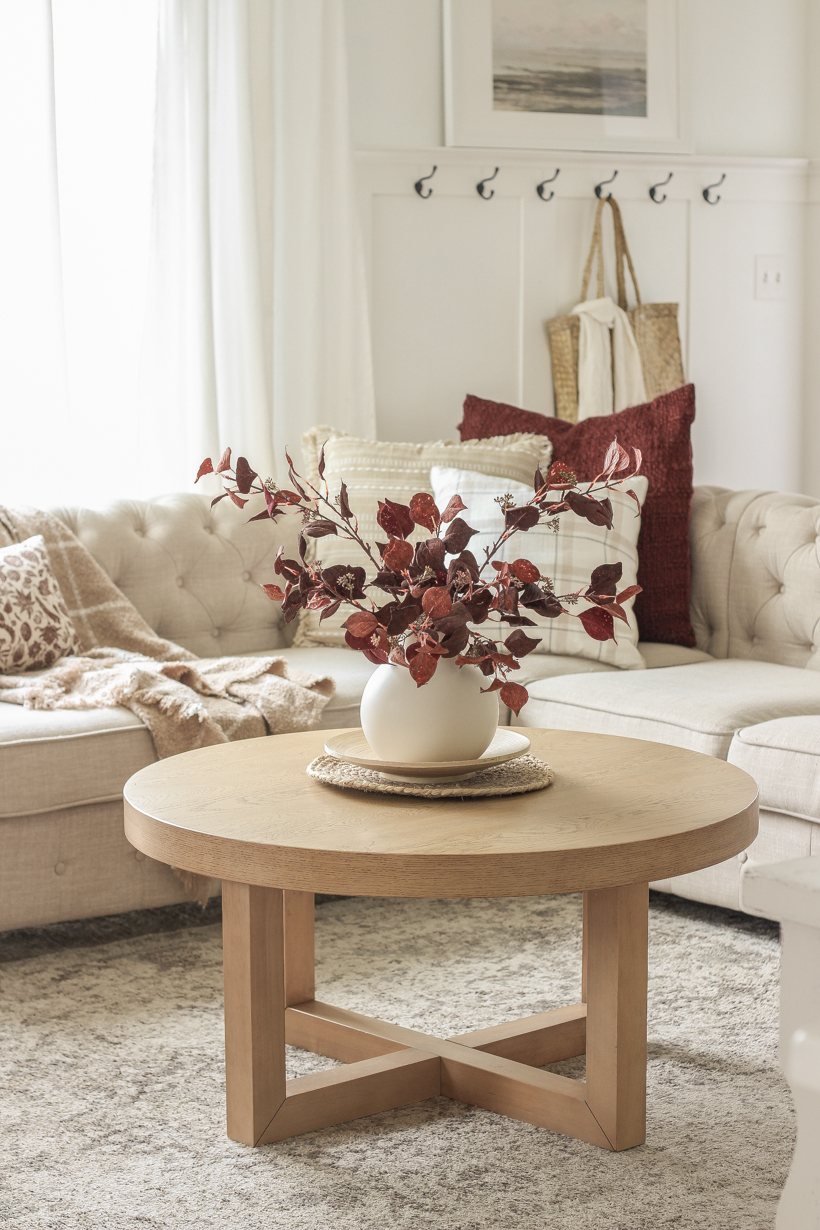 Simple fall decor with pops of burgundy and lots of cozy textures in the home of blogger and interior decorator Liz Fourez