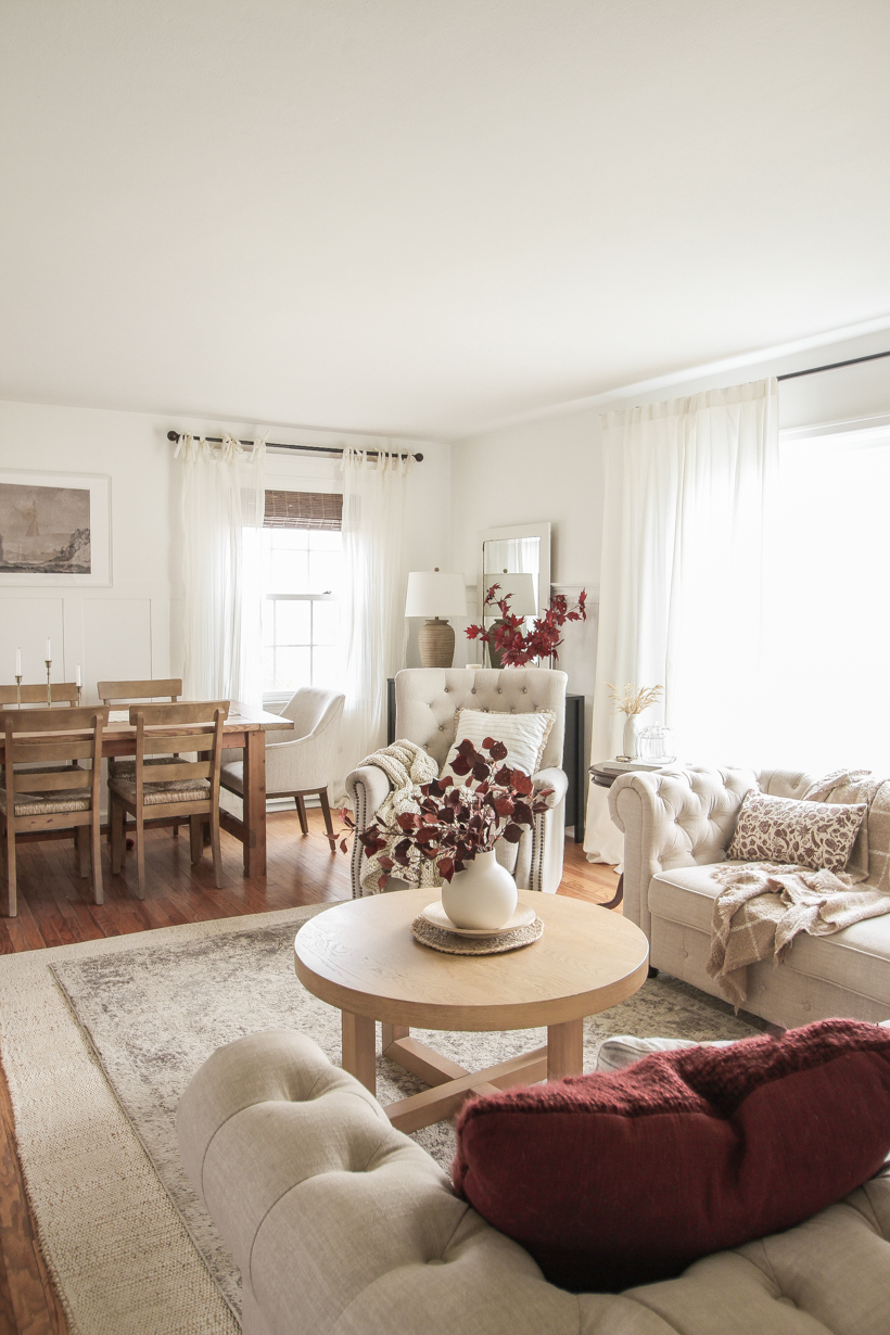 Simple fall decor with pops of burgundy and lots of cozy textures in the home of blogger and interior decorator Liz Fourez