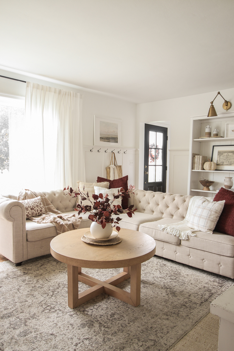 Simple fall decor with pops of burgundy and lots of cozy textures in the home of blogger and interior decorator Liz Fourez