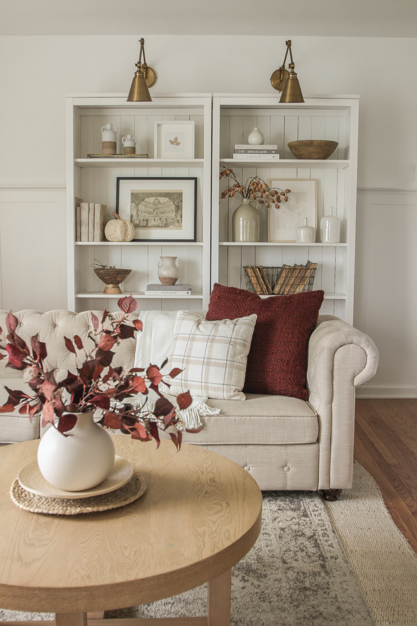 Simple fall decor with pops of burgundy and lots of cozy textures in the home of blogger and interior decorator Liz Fourez