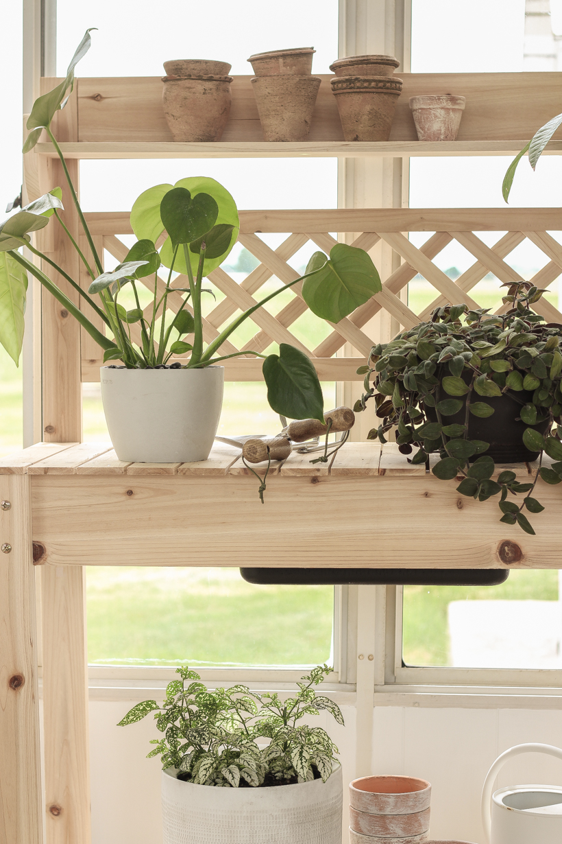 Home blogger and interior decorator Liz Fourez shares ideas for sprucing up your outdoor spaces like this affordable potting bench.