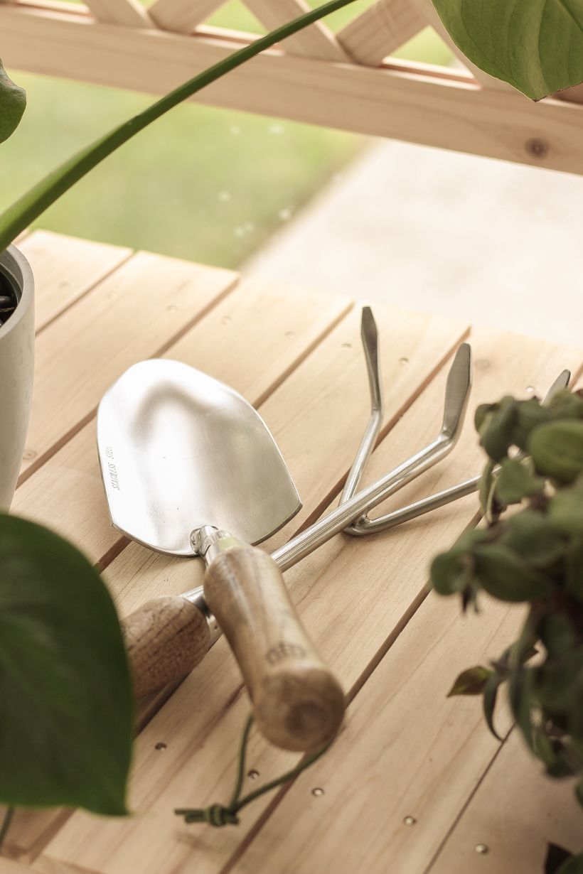 Home blogger and interior decorator Liz Fourez shares ideas for sprucing up your outdoor spaces like this affordable potting bench.