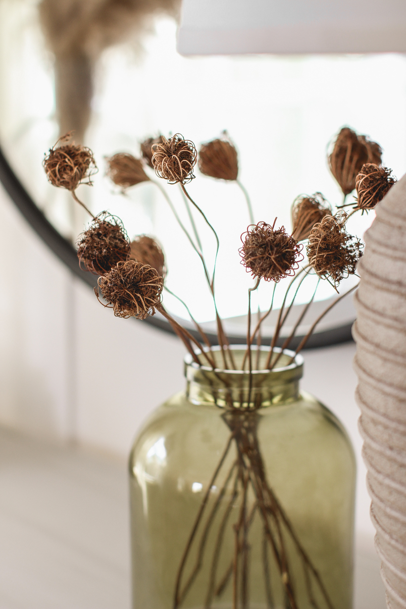 Add one or more of these beautiful faux stems to a vase for the easiest fall decor - curated by home blogger and interior decorator Liz Fourez