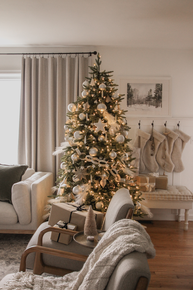 A beautiful living room dressed for the holidays by home blogger and interior decorator Liz Fourez