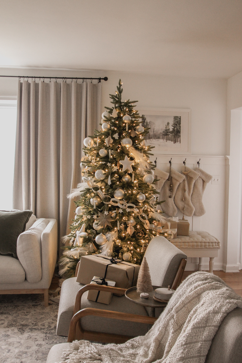 A beautiful living room dressed for the holidays by home blogger and interior decorator Liz Fourez