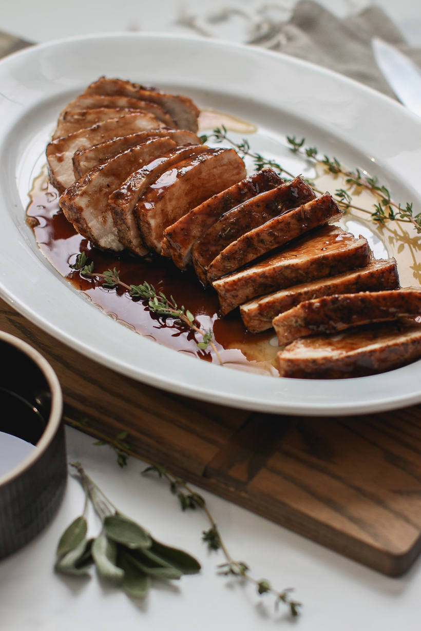 Easy oven roasted pork tenderloin topped with the most delicious balsamic glaze