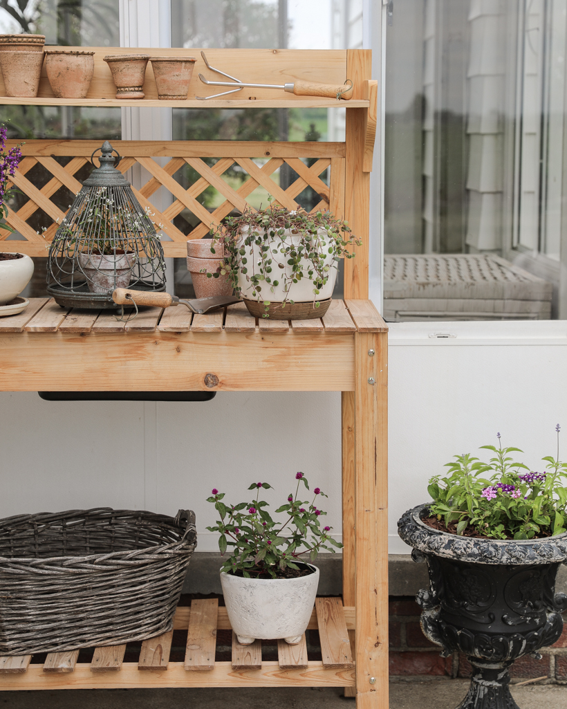 Styled potting bench with plants