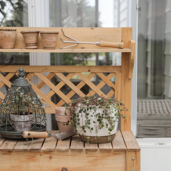 Styled potting bench with plants